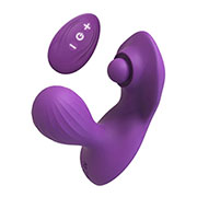 Vibracijski analni stimulator s stimulatorjem presredka